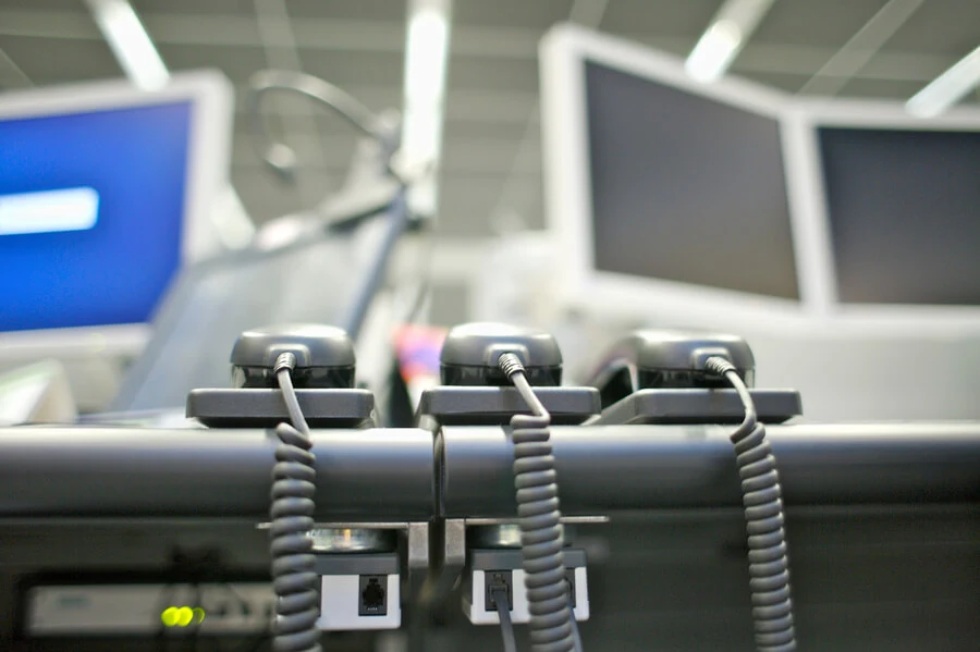 telephones-on-desk-at-stock-market-2025-10-16-23-26-00-utc